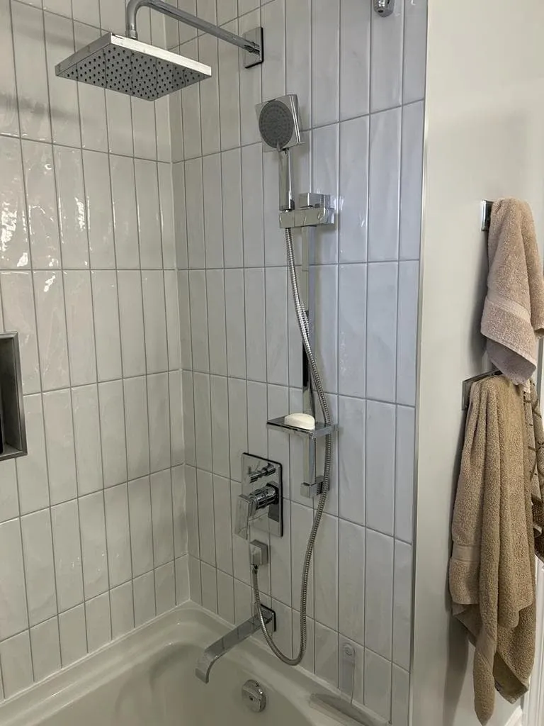 shower installation ottawa plumber plumber on the phone